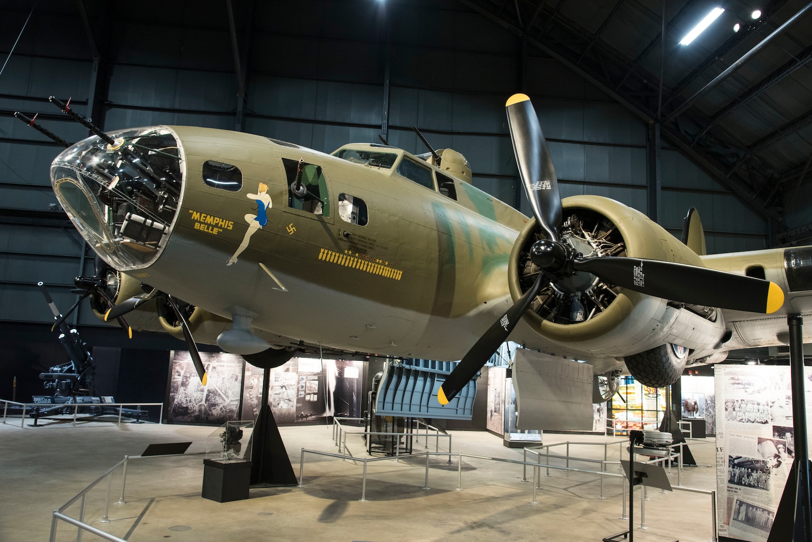 Boeing B-17F Memphis Belle on display in the WWII Gallery at the National Museum of the United States Air Force. B-17's  flew in every combat zone during World War II, but its most significant service was over Europe. Along with the B-24 Liberator, the B-17 formed the backbone of the USAAF strategic bombing force, and it helped win the war by crippling Germany’s war industry.  (U.S. Air Force photo by Ken LaRock)