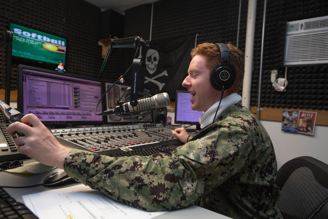sailor in studio talking on radio