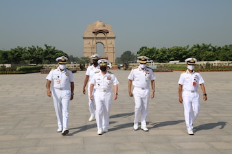 NEW DELHI (Oct. 12, 2021) Chief of Naval Operations (CNO) Adm. Mike Gilday, middle, arrives at the National War Memorial in New Dehli for a wreath laying. Gilday is in India to meet with India Chief of Naval Staff Admiral Karambir Singh and other senior leaders from the Indian Navy and government. (Photo courtesy of U.S. State Department/Released)