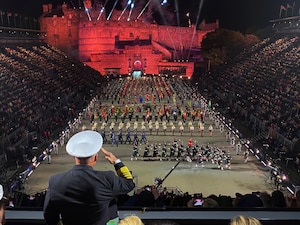 EDINBURGH, Scotland (Aug. 20, 2022) - Chief of Naval Operations (CNO) Adm. Mike Gilday renders a salute as the Royal Navy's guest of honor at the Royal Edinburgh Military Tattoo in Edinburgh, Scotland, Aug. 20. This visit was part of an international trip to Spain and the United Kingdom to engage with Sailors and meet with local military and government leadership to discuss regional and maritime security, as well as interoperability. (U.S. Navy photo by Capt. Gregory Leland/released)