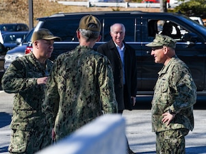GROTON, Conn. (Feb. 28, 2022) Chief of Naval Operations (CNO) Adm. Mike Gilday, right, speaks with Rear Adm. Richard Seif, Commander, Undersea Warfighting Development Center (UWDC). Gilday and Rep. Joe Courtney, of Connecticut’s 2nd Congressional District, visited the Naval Submarine Base New London waterfront and Naval Submarine School after touring nearby General Dynamics Electric Boat Shipyard submarine construction facilities. (U.S Navy photo by Mass Communication Specialist 3rd Class Maxwell Higgins)