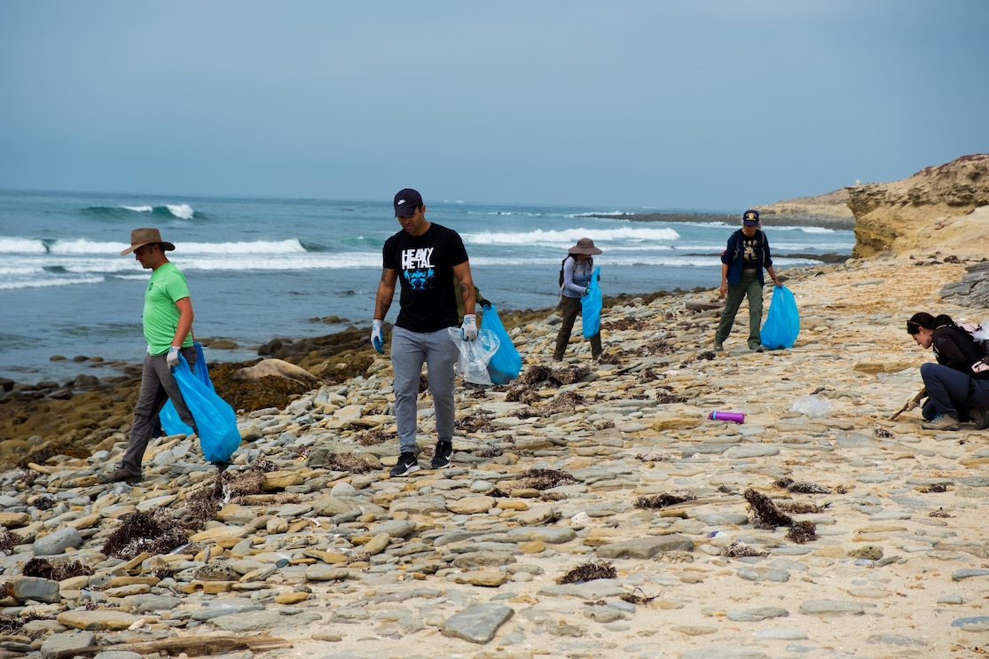 Sailors participate in an annual coastal cleanup on San Nicolas Island in California.