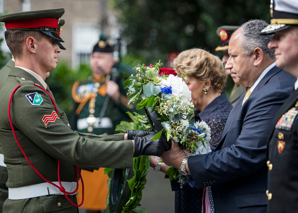 Secretary of the Navy Carlos Del Toro prepares to lay a wreath at the National Memorial to members of the Defence Forces who died in the service of the State in Dublin, Ireland
