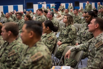 Sailors listen to MyNavy HR leaders during a Town Hall meeting