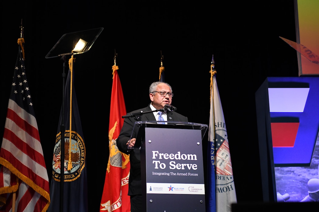 Secretary of the Navy (SECNAV) Carlos Del Toro delivers remarks at a Blue Star Families and Chamberlain Project panel symposium.