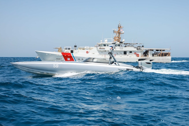 ARABIAN GULF (June 1, 2023) U.S. Coast Guard fast response cutter USCGC Clarence Sutphin Jr. (WPC 1146) sails alongside a MARTAC T-38 Devil Ray unmanned surface vessel in the Arabian Gulf, June 1, 2023, during exercise Eagle Resolve 23. Eagle Resolve is a combined joint all-domain exercise that improves interoperability on land, in the air, at sea, in space, and in cyberspace with the U.S. military and partner nations, enhances the ability to respond to contingencies, and underscores U.S. Central Command's commitment to the Middle East. (U.S. Army photo by Spc. James Webster)