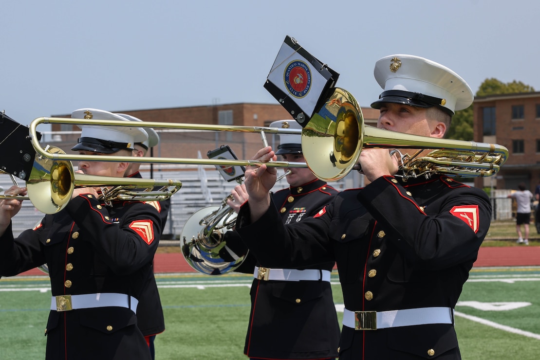 The Quantico Marine Band performs at Hauppauge High School, Long Island, New York during the first day of Fleet Week New York (FWNY), May 24, 2023. Throughout FWNY 2023, more than 3,000 service members from the Marine Corps, Navy and Coast Guard and our NATO allies from Great Britain, Italy and Canada are engaging in special events throughout New York City and the surrounding Tri-State Region, showcasing the latest capabilities of today’s maritime services and connecting with citizens. The events include free public ship tours, military static displays, and live band performances and parades. (U.S. Marine Corps photo by Lance Cpl. David Brandes)
