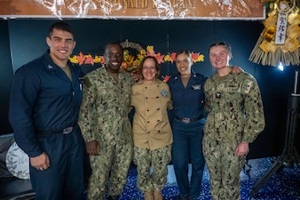 YOKOSUKA, Japan (Nov. 23, 2023) – Chief of Naval Operations Adm. Lisa Franchetti eats Thanksgiving dinner with Sailors aboard the U.S. Navy's only forward-deployed aircraft carrier USS Ronald Reagan (CVN 76), Nov. 23. Franchetti and Master Chief Petty Officer of the Navy James Honea visited Reagan and other 7th Fleet commands to engage with Sailors and Navy leadership to highlight Franchetti's priority of strengthening the Navy team. (U.S. Navy photo by Chief Mass Communication Specialist Amanda R. Gray)