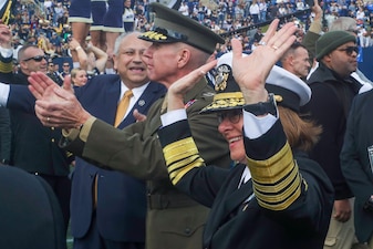 ANNAPOLIS, Md. (Oct. 21, 2023) -- Vice Chief of Naval Operations Adm. Lisa Franchetti, Commandant of the Marine Corps Gen. Eric Smith, and Secretary of the Navy Carlos Del Toro cheer on the United States Naval Academy Midshipmen during an NCAA football game against the U.S. Air Force Academy at Navy Marine Corps Stadium, Oct. 21, 2023. This is the 56th Navy-Air Force football game, with Air Force leading the all-time series 33-22. (U.S. Navy photo by Mass Communication Specialist 2nd Class Jonteil Johnson/Released)