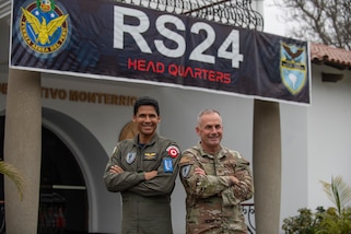 Peruvian Air Force Col. Fidel Castro, Combined Joint Task Force – Resolute Sentinel 2024 deputy commander, left, and U.S. Air Force Col. Barton Kenerson, CJTF – RS24 commander, pose for a photo at task force headquarters in Lima, Peru, May 30, 2024. This combined, joint force exercise focuses on building strong partnerships with partner nation militaries enabling readiness for any future shared challenges. (U.S. Air Force photo by Andrea Jenkins)