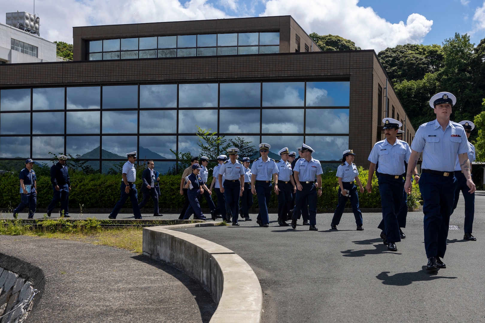 Japanese instructors at the Japan Coast Guard School lead U.S. Coast Guardsmen, assigned to the U.S. Coast Guard Cutter Waesche (WMSL-751), on a school tour in Maizuru, Japan, June 5, 2024. The tour offered U.S. Coast Guardsmen a better understanding of the training members of the Japanese Coast Guard receive prior to service. U.S. Coast Guard missions in the Indo-Pacific focus on issues directly supporting and advancing our regional partners’ efforts to protect fish stocks, ensure safety of life at sea, support environmental response, and provide disaster relief. (U.S. Marine Corps photo by Cpl. Elijah Murphy)