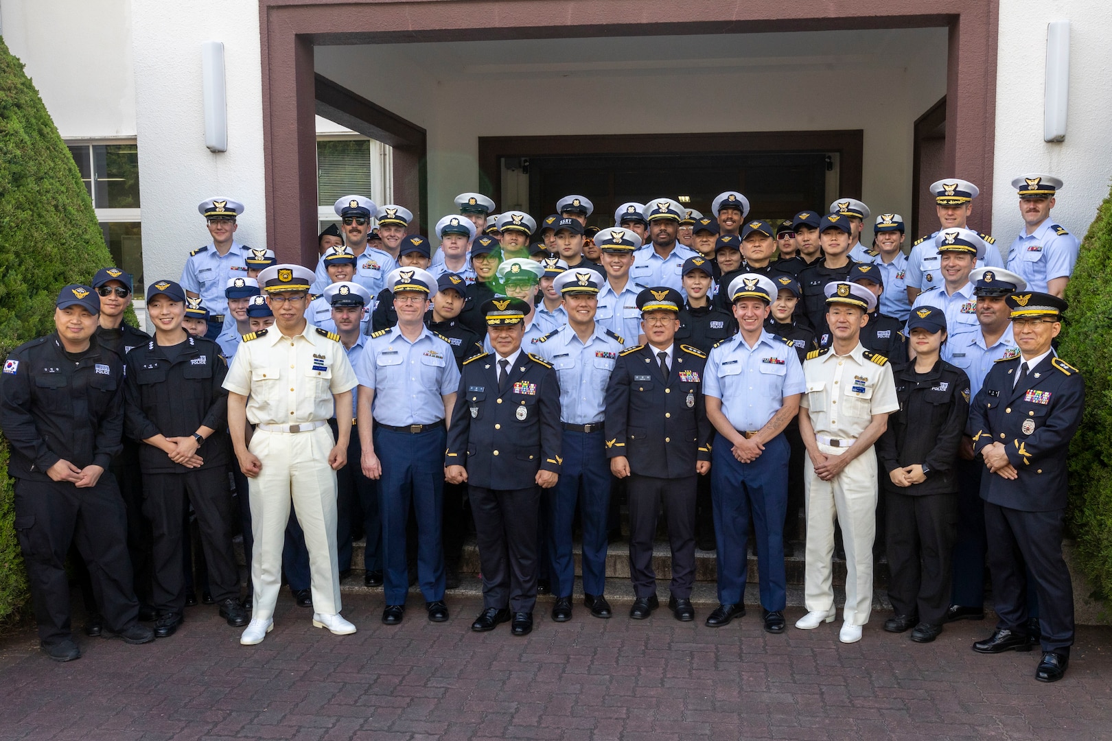 U.S. Coast Guardsmen assigned to the U.S. Coast Guard Cutter Waesche (WMSL-751), members of the Republic of Korea Coast Guard, and members of the Japanese Coast Guard pose for a photo outside of the Japanese Coast Guard Training School in Maizuru, Japan, June 5, 2024. Members of the Japanese coast guard led U.S. and Republic of Korea Coast Guardsmen on a tour of the facilities at the training school and some of the curriculum taught there. Waesche is deployed to the Indo-Pacific to advance relationships with ally and partner nations to build a more stable, free, open and resilient region with unrestricted, lawful access to the Maritime Commons. (U.S. Marine Corps photo by Cpl. Elijah Murphy)