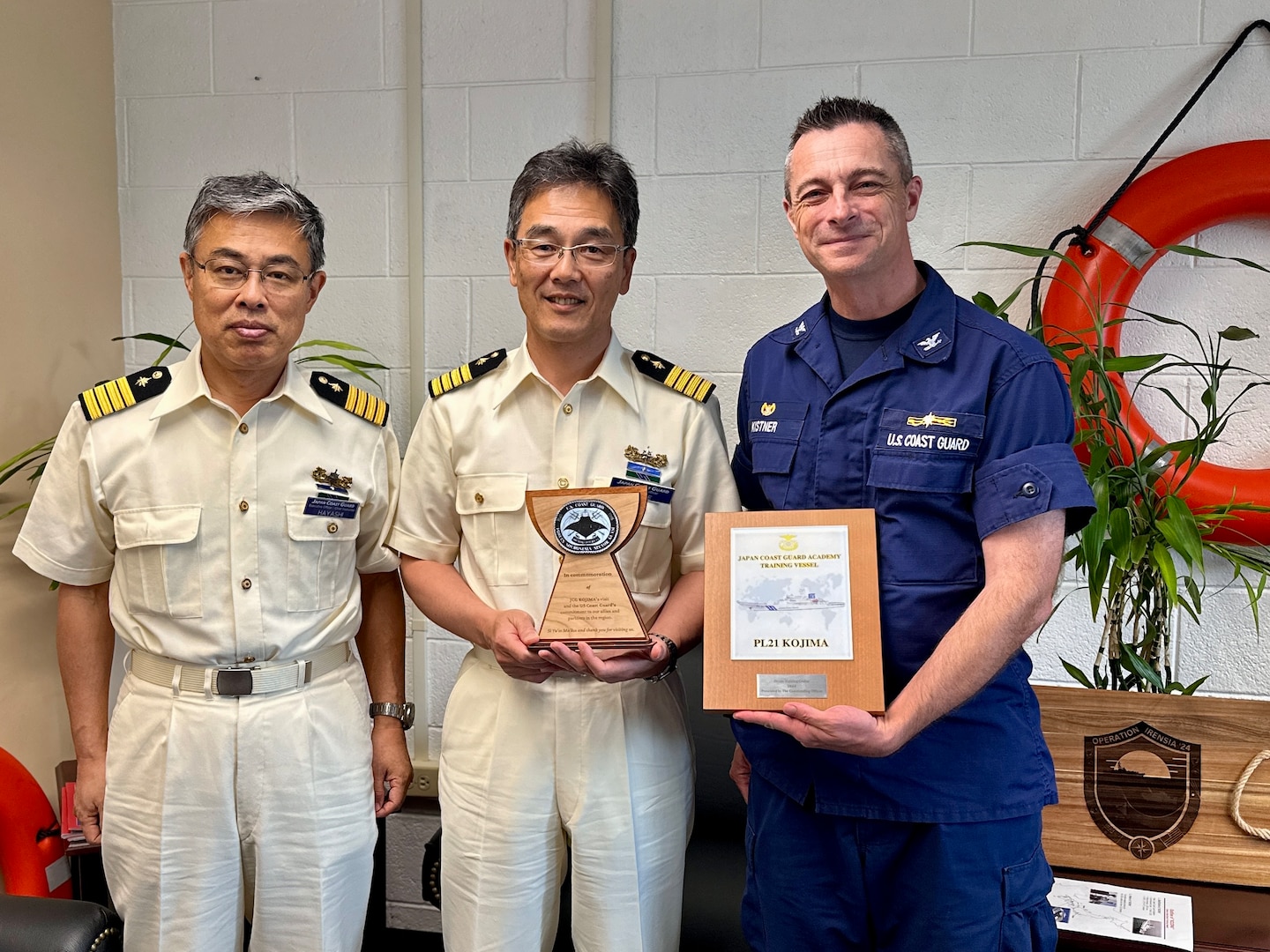 Capt. Robert Kistner, commander of U.S. Coast Guard Forces Micronesia Sector Guam, hosts Capt. Kazushi Sakae, Capt. Hayashi, and over 40 cadets from the Japanese Coast Guard training ship Kojima during their visit to Guam on June 12, 2024. The event marked a significant moment of international cooperation and camaraderie between the two maritime services. (U.S. Coast Guard photo by Chief Warrant Officer Sara Muir)