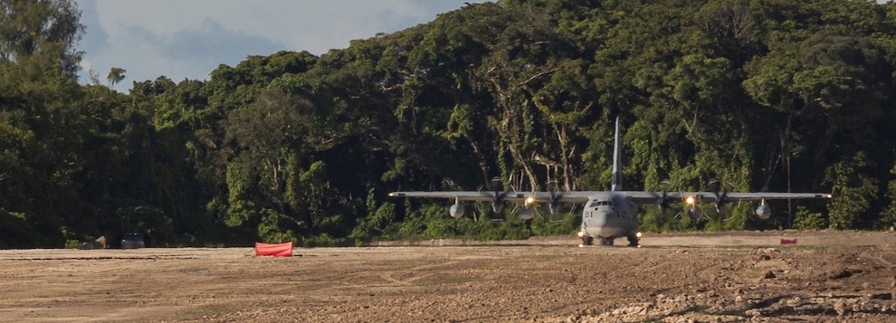 A U.S. Marine Corps KC-130J Super Hercules aircraft with 1st Marine Air Wing, lands on a newly designated airstrip on the island of Peleliu, Republic of Palau.