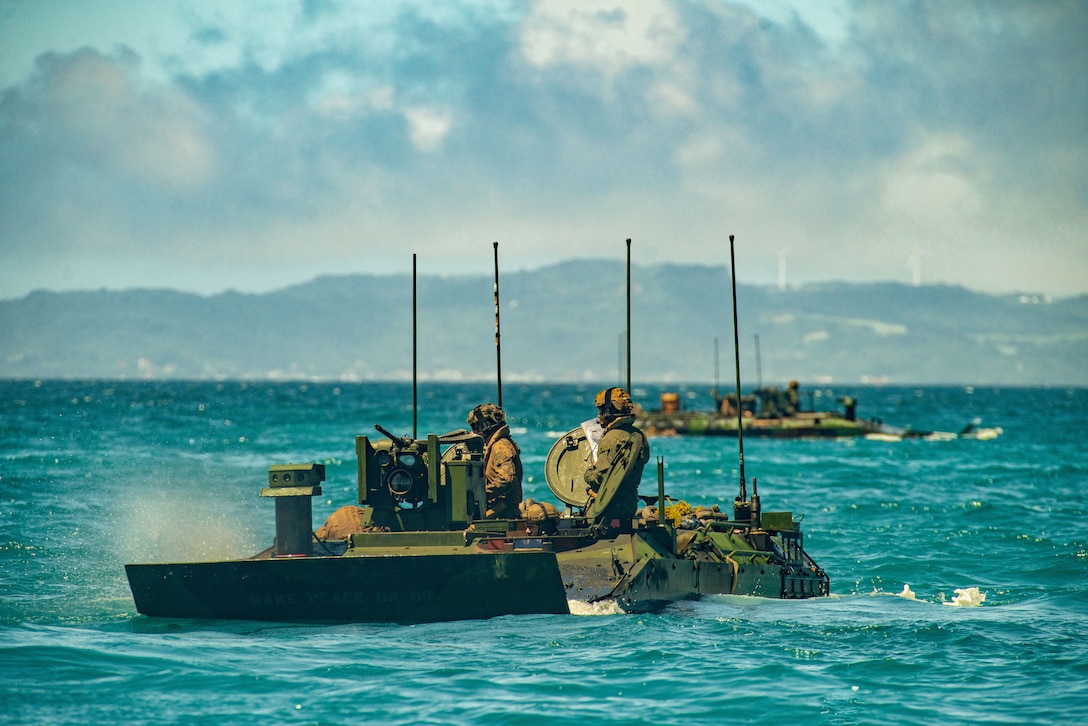 U.S. Marine Corps Amphibious Combat Vehicles attached to Alpha Company, Battalion Landing Team 1/5, 15th Marine Expeditionary Unit, conduct waterborne operations at White Beach Naval Facility, Okinawa, Japan, June 24, 2024. Harpers Ferry and embarked elements of the 15th MEU are conducting routine operations in the U.S. 7th Fleet area of operations. 7th Fleet is the U.S. Navy’s largest forward-deployed numbered fleet, and routinely interacts and operates with allies and partners in preserving a free and open Indo-Pacific region. (U.S. Marine Corps photo by Lance Cpl. Peyton Kahle)
