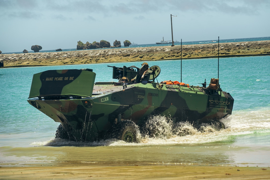 U.S. Marine Corps Amphibious Combat Vehicles attached to Alpha Company, Battalion Landing Team 1/5, 15th Marine Expeditionary Unit, conduct an amphibious landing after waterborne operations at White Beach Naval Facility, Okinawa, Japan, June 24, 2024. Harpers Ferry and embarked elements of the 15th MEU are conducting routine operations in the U.S. 7th Fleet area of operations. 7th Fleet is the U.S. Navy’s largest forward-deployed numbered fleet, and routinely interacts and operates with allies and partners in preserving a free and open Indo-Pacific region. (U.S. Marine Corps photo by Lance Cpl. Peyton Kahle)