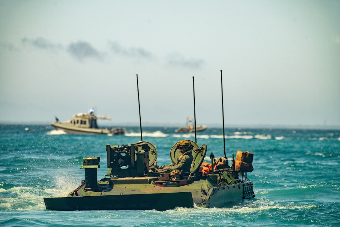U.S. Marine Corps Amphibious Combat Vehicles attached to Alpha Company, Battalion Landing Team 1/5, 15th Marine Expeditionary Unit, conduct waterborne operations at White Beach Naval Facility, Okinawa, Japan, June 24, 2024. Harpers Ferry and embarked elements of the 15th MEU are conducting routine operations in the U.S. 7th Fleet area of operations. 7th Fleet is the U.S. Navy’s largest forward-deployed numbered fleet, and routinely interacts and operates with Allies and partners in preserving a free and open Indo-Pacific region.