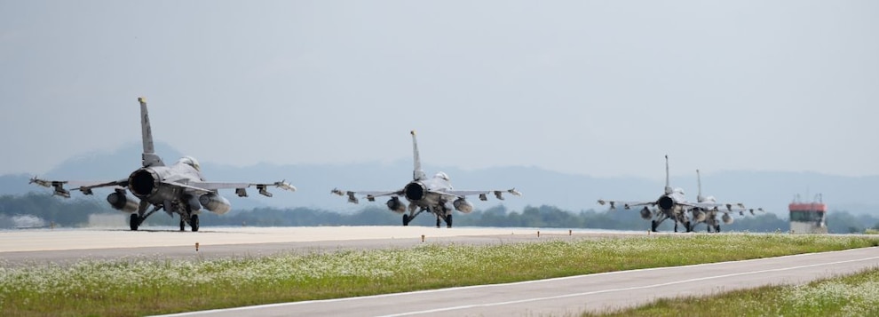 Four F-16 Fighting Falcon aircraft, assigned to the 80th Fighter Squadron, taxi down the flightline for take off as part of Buddy Squadron 24-4 at Cheongju Air Base, Republic of Korea, June 25, 2024.
