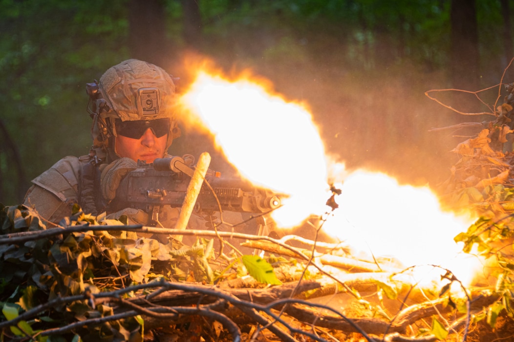 Senior Airman Daniel Knight, assigned to the 302nd Security Force Squadron, fires at opposition forces