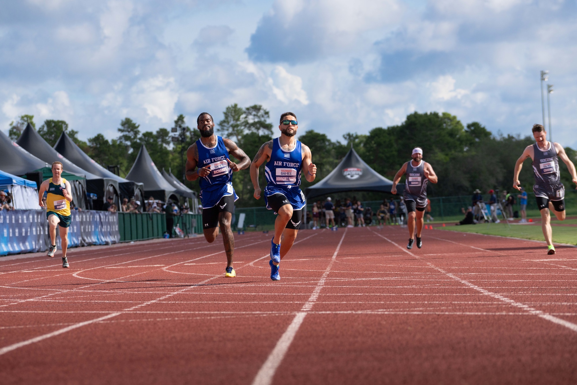 SrA James Richards (ret) and SrA Jomar Rodriguez Pagan (ret) participating in track during the 2024 Warrior Games. (From left to right).