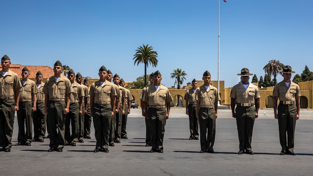 U.S. Marines with Echo Company, 2nd Recruit Training Battalion, are recognized in formation during a naturalization ceremony at Marine Corps Recruit Depot, San Diego, June 27, 2024. The naturalization ceremony took place during family day to recognize Marines who became United States citizens by completing bootcamp. (U.S. Marine Corps photo by Sgt. Yvonna Guyette)