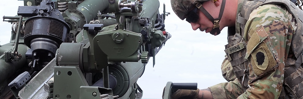 Spc. Michael Hawkins, with B Battery, 2nd Battalion, 123rd Field Artillery Regiment, Illinois Army National Guard, adjusts the elevation of an M777 155mm howitzer while executing a fire mission during exercise Immediate Response in Ustka, Poland, May 11, 2024. More than 10,400 U.S. military members and 12,750 service members from Allied and partner nations are participating in the exercise, which includes live-fire exercises, wet gap crossings, and other training to strengthen interoperability among participants. (U.S. Army photo by Sgt. 1st Class Jon Soucy)